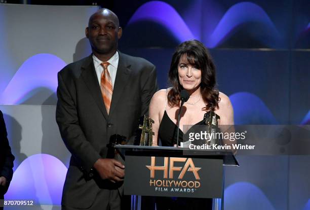 Honorees Broderick Johnson and Cynthia Sikes Yorkin accept the Hollywood Producer Award for 'Blade Runner 2049' onstage at the 21st Annual Hollywood...