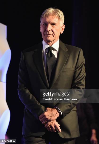 Harrison Ford stands onstage during the 21st Annual Hollywood Film Awards at The Beverly Hilton Hotel on November 5, 2017 in Beverly Hills,...