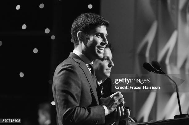 Scott Neustadter and Michael H. Weber accept an award onstage during the 21st Annual Hollywood Film Awards at The Beverly Hilton Hotel on November 5,...