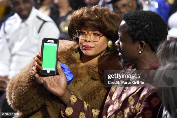 Host Erykah Badu and Michael Blackson attend the 2017 Soul Train Awards, presented by BET, at the Orleans Arena on November 5, 2017 in Las Vegas,...