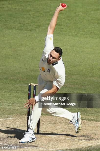 Scott Boland of Victoria bowls during day three of the Sheffield Shield match between Victoria and South Australia at Melbourne Cricket Ground on...