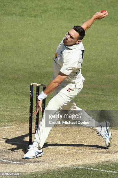 Scott Boland of Victoria bowls during day three of the Sheffield Shield match between Victoria and South Australia at Melbourne Cricket Ground on...