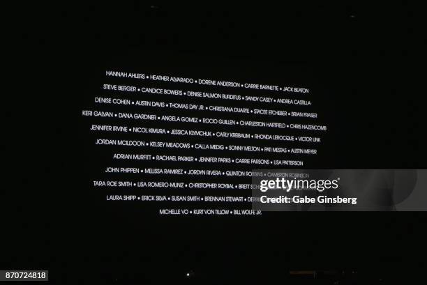 Screen with the 58 names of people who were killed in the mass shooting by Stephen Paddock at the Route 91 Harvest country music festival is...