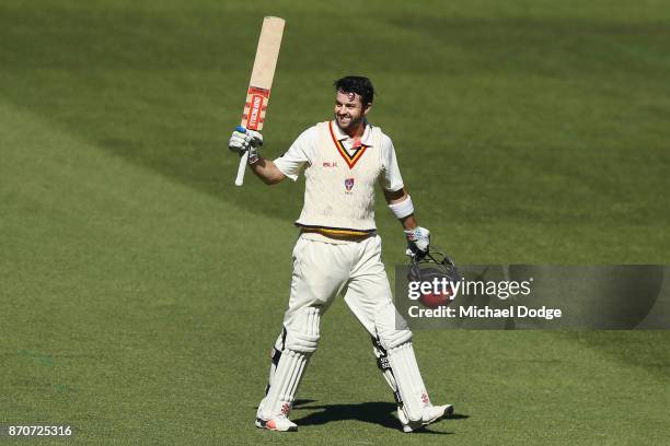 Callum Ferguson of South Australia celebrates making a century during day three of the Sheffield Shield match between Victoria and South Australia at...