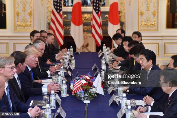 President Donald Trump, fourth left, and Shinzo Abe, Japan's Prime Minister, third right, attend a summit meeting at Akasaka Palace in Tokyo, Japan,...