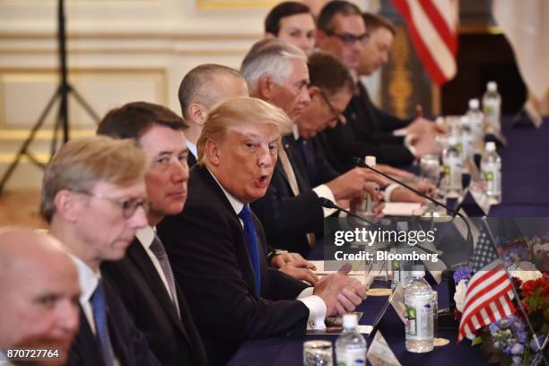 President Donald Trump, fourth left, speaks during a summit meeting with Shinzo Abe, Japan's Prime Minister, not pictured, at Akasaka Palace in...