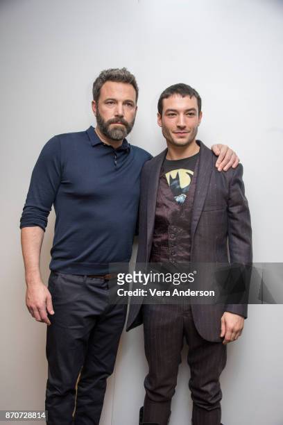 Ben Affleck and Ezra Miller at the "Justice League" Press Conference at The Rosewood Hotel on November 4, 2017 in London, England.
