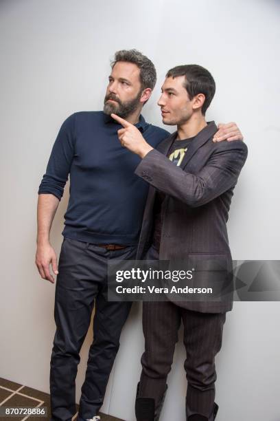 Ben Affleck and Ezra Miller at the "Justice League" Press Conference at The Rosewood Hotel on November 4, 2017 in London, England.