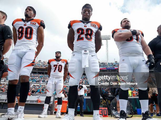 Wide Receiver Josh Malone, Tackle Cedric Ogbuehi, Runningback Joe Mixion and Center Russell Boling of the Cincinnati Bengals during the National...