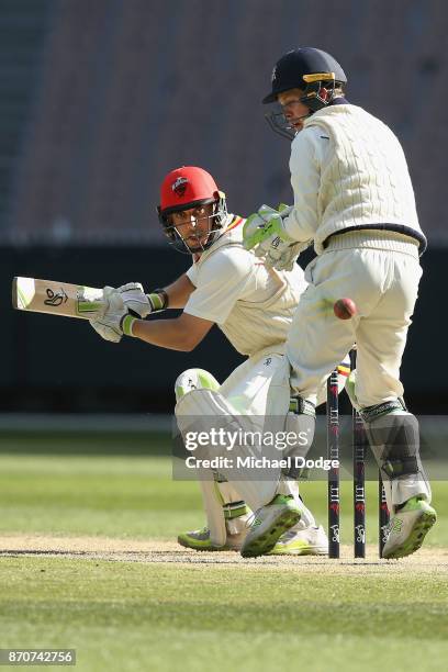 Jake Lehmann of South Australia only just cuts the ball late past the gloves of Victoria keeper Sam Harper during day three of the Sheffield Shield...