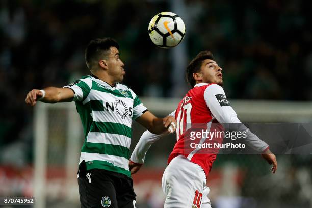 Sporting's midfielder Marcos Acuna vies for the ball with Braga's midfielder Xadas during Primeira Liga 2017/18 match between Sporting CP vs SC...