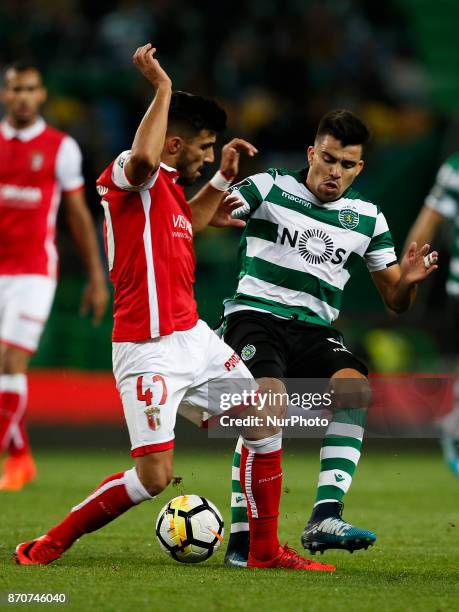 Braga's midfielder Ricardo Esgaio vies for the ball with Sporting's midfielder Marcos Acuna during Primeira Liga 2017/18 match between Sporting CP vs...