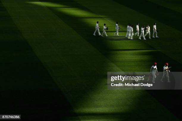 An undefeated Callum Ferguson of South Australia walks off with Alex Carey at the end of day three of the Sheffield Shield match between Victoria and...