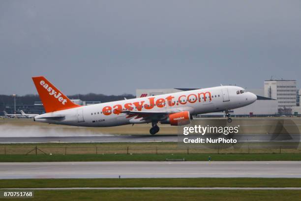 EasyJet airplanes as seen in Amsterdam airport and Polderbaan runway in March. EasyJet is British low cost airline, with branches in Switzerland and...