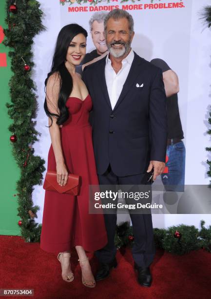 Mel Gibson and Rosalind Ross arrive at the premiere of Paramount Pictures' "Daddy's Home 2" at Regency Village Theatre on November 5, 2017 in...