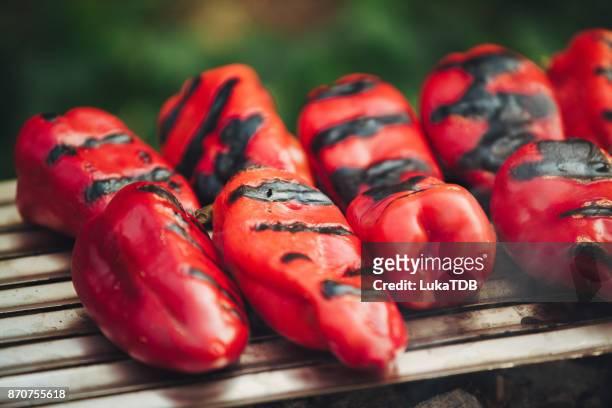 preparation paprika on broil - roasted pepper stock pictures, royalty-free photos & images