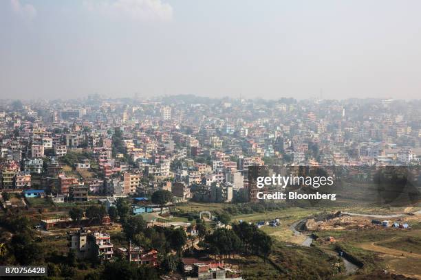 Buildings stand in Kathmandu, Nepal, on Wednesday, Nov. 1, 2017. India and China have often jostled for influence in Nepal, a nation of 28 million...