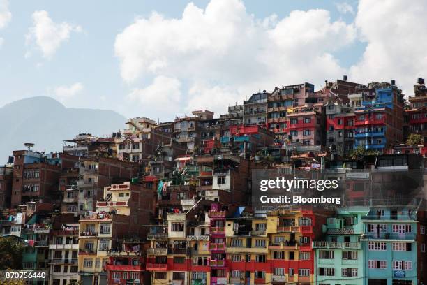 Residential buildings stand in Kathmandu, Nepal, on Wednesday, Nov. 1, 2017. India and China have often jostled for influence in Nepal, a nation of...