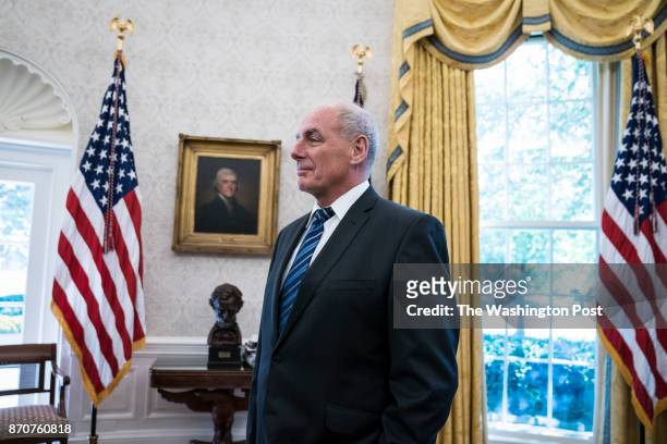 White House Chief of Staff John Kelly listens as President Donald Trump speaks during a meeting with UN Secretary General Antonio Guterres in the...