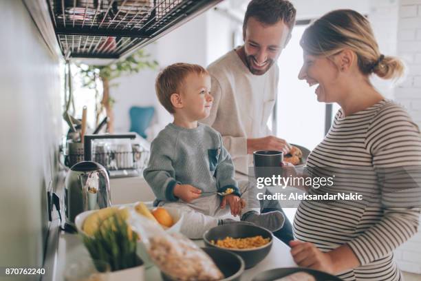 crowdy in our kitchen - breakfast fathers imagens e fotografias de stock