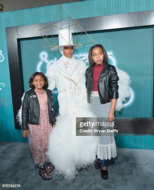Mars Merkaba Thedford, host Erykah Badu and Puma Sabti Curry attend the 2017 Soul Train Music Awards at the Orleans Arena on November 5, 2017 in Las...