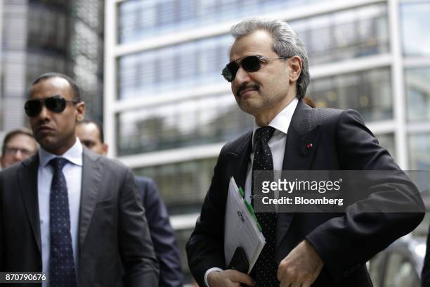 Prince Alwaleed Bin Talal, Saudi billionaire and founder of Kingdom Holding Co., right, arrives to give evidence at the High Court in London, U.K.,...