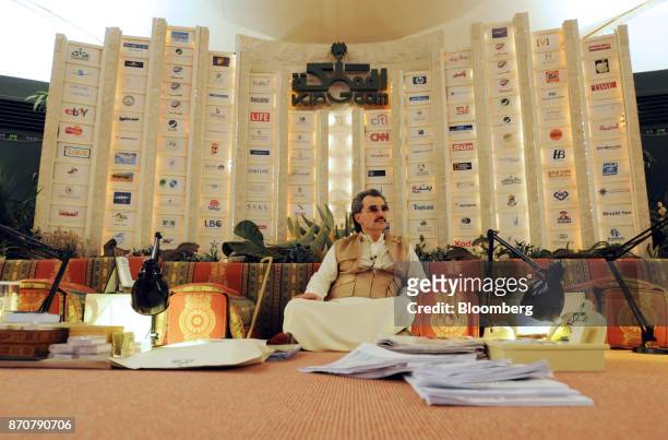 Saudi Prince Alwaleed bin Talal, sits surrounded by paperwork whilst inside his desert camp near Riyadh, Saudi Arabia, on Wednesday, April 28, 2010....