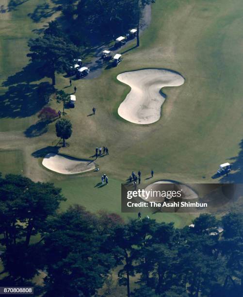 In this aerial image, U.S. President Donald Trump plays golf with Japanese Prime Minister Shinzo Abe and Hideki Matsuyama at Kasumigaseki Country...