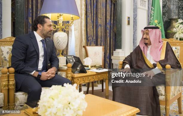 King of Saudi Arabia Salman bin Abdulaziz Al Saud receives Former Prime Minister of Lebanon Saad Hariri , who resigned recently, at Palace of Yamamah...