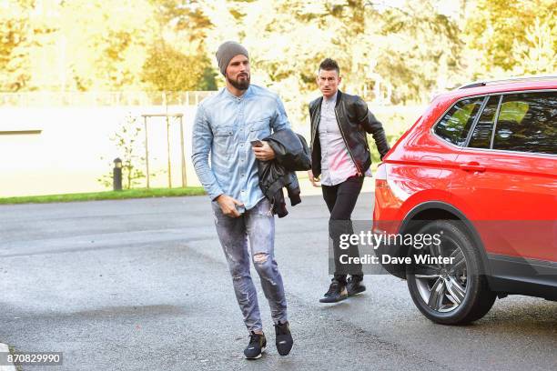 Olivier Giroud of France and Laurent Koscielny of France arrive at the Centre National du Football in Clairefontaine en Yvelines, France on November...