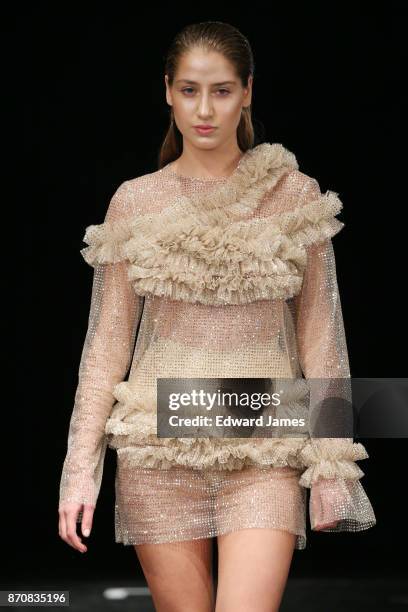 Model walks the runway during the Mach & Mach fashion show at Mercedes-Benz Fashion Week Tbilisi on November 5, 2017 in Tbilisi, Georgia.