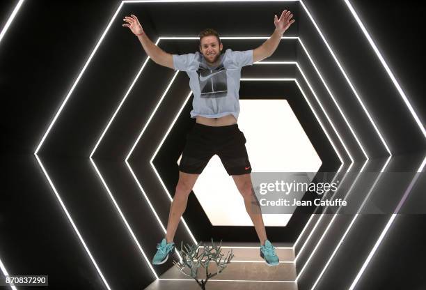 Jack Sock of USA poses with the trophy after winning the final against Filip Krajinovic of Serbia on day 7 of the Rolex Paris Masters 2017, a Masters...