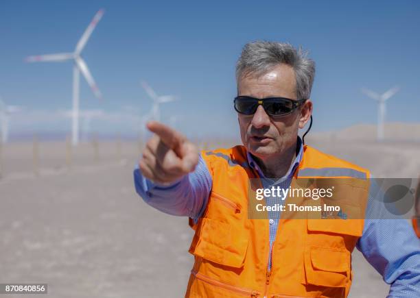 Atacama Desert, Chile Portrait of GIZ Program Manager Energy, Rainer Schroeer, in front of a wind farm in the Atacama Desert on October 17, 2017 in...