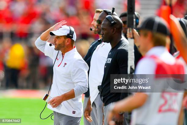 Texas Tech Red Raiders defensive coordinator David Gibbs signals to the defense during the game against the Kansas State Wildcats on November 4, 2017...