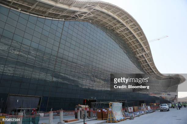 Building materials sit outside Abu Dhabi airport's MidField terminal during construction in Abu Dhabi, United Arab Emirates, on Monday, Nov. 6, 2017....