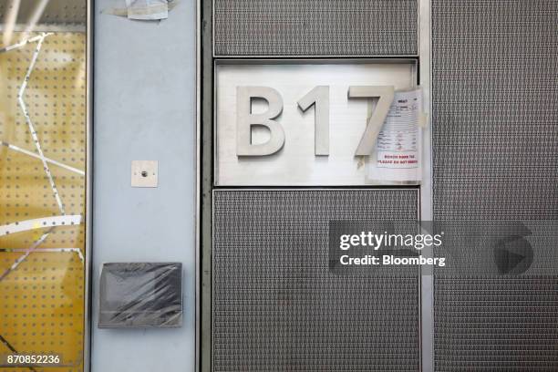 Protective wrappings cover an electronic panel on a boarding gate wall at Abu Dhabi airport's MidField terminal during construction in Abu Dhabi,...