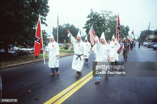 Supporters of the Ku Klux Klan march May 4 Stone Mountain, Georgia
