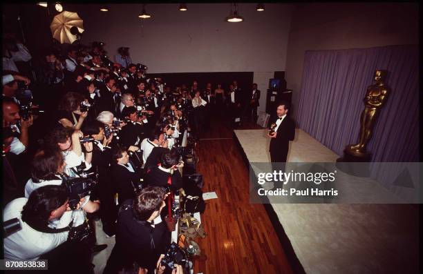 Steven Spielberg facing photographers backstage at the Oscars April 11, 1988 Dorothy Chandler Pavilion, Los Angeles, California