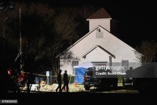 Law enforcement officials continue their investigation at First Baptist Church of Sutherland Springs during the early morning hours of November 6,...