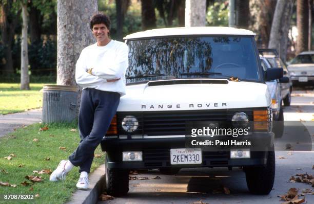 Mark Spitz outside his home after training with his Range Rover , he is trying to get in shape for the 1992 Olympics, Mark Spitz is trying to get in...