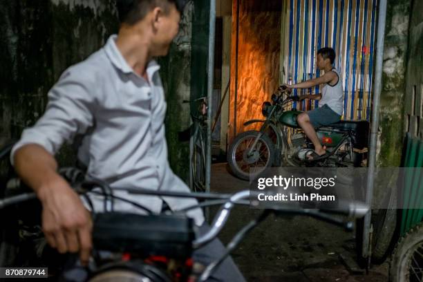 Minsk motorcyclists get their bikes fixed at the repairing store of Pham Ngoc Thach, 27 - a Minsk motorcycle enthusiast turned into career engineer...