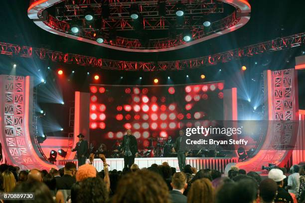 Michael Keith, Daron Jones, Marvin Slim Scandrick, and Quinnes Q Parker of 112 perform during the 2017 Soul Train Music Awards at the Orleans Arena...