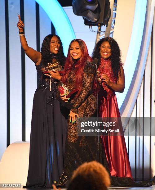 Cheryl 'Coko" Clemons, Leanne 'Lelee' Lyons and Tamara 'Taj' Johnson-George of SWV accept the Lady of Soul Award during the 2017 Soul Train Music...