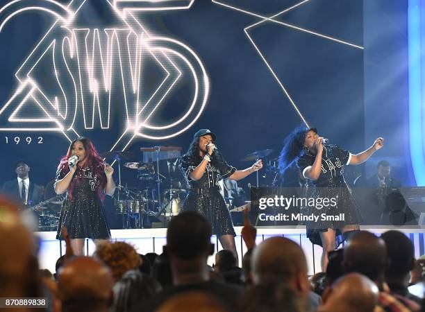 Leanne 'Lelee' Lyons, Cheryl 'Coko' Clemons and Tamara 'Taj' Johnson-George of SWV perform during the 2017 Soul Train Music Awards at the Orleans...