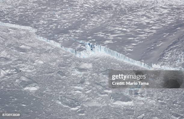 Calving glacier is seen from NASA's Operation IceBridge research aircraft, in the Antarctic Peninsula region, on October 31 above Antarctica. NASA's...