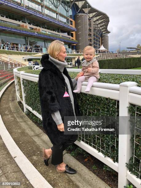 Hannah Strafford-Taylor and daughter Winter attend race day at Ascot Racecourse on November 4, 2017 in Ascot, England.