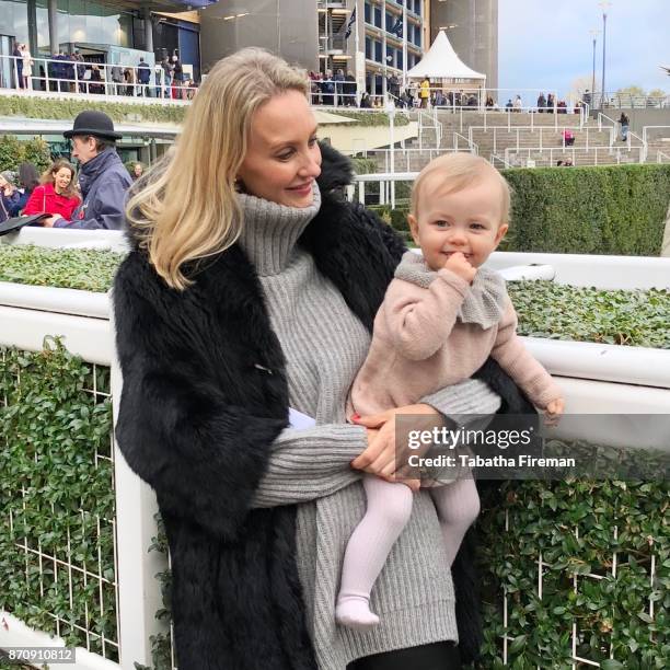 Hannah Strafford-Taylor and daughter Winter attend race day at Ascot Racecourse on November 4, 2017 in Ascot, England.