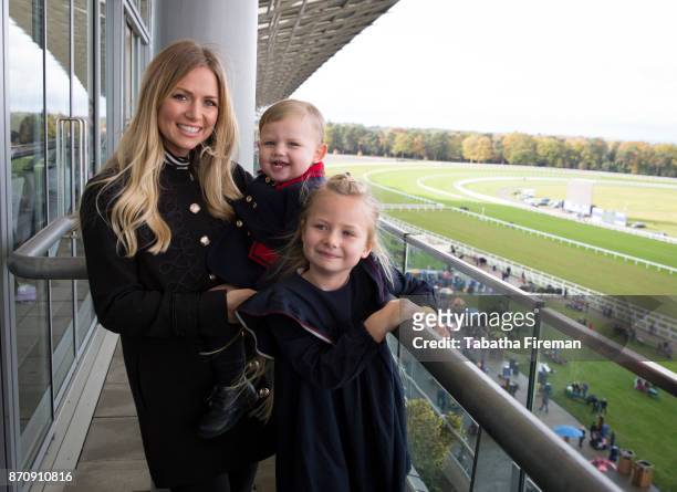 Young racegoers attend race day at Ascot Racecourse on November 4, 2017 in Ascot, England.