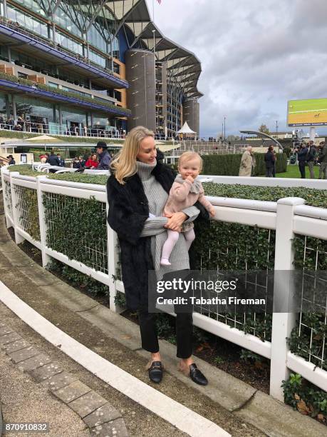 Hannah Strafford-Taylor and daughter Winter attend race day at Ascot Racecourse on November 4, 2017 in Ascot, England.