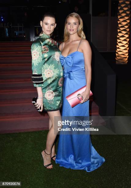 Model Behati Prinsloo and actor Rosie Huntington-Whiteley, wearing Gucci, attend the 2017 LACMA Art + Film Gala Honoring Mark Bradford and George...